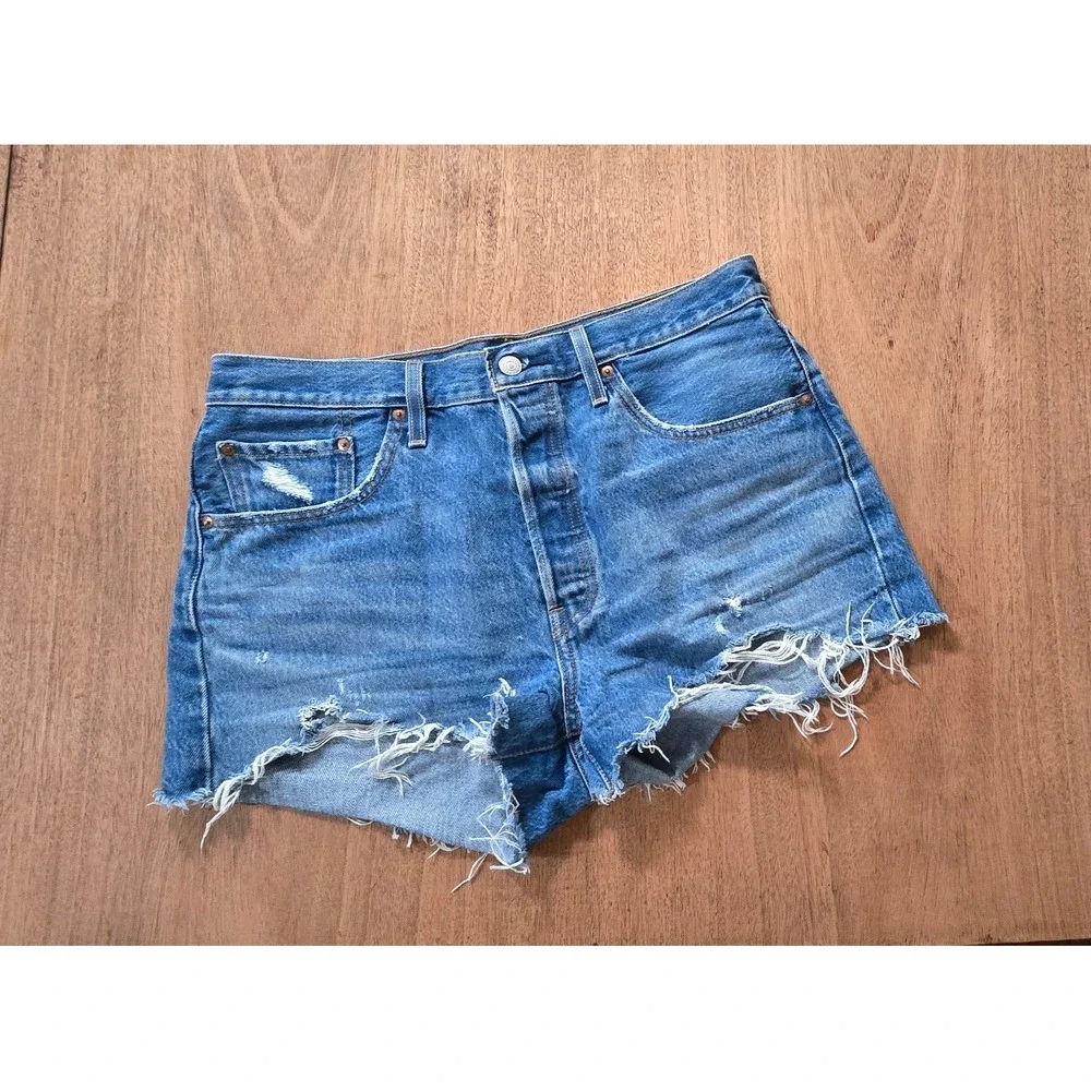VINTAGE LEVIS BIG E 32 stone wash blue button fly cutoff jean shorts farmcore